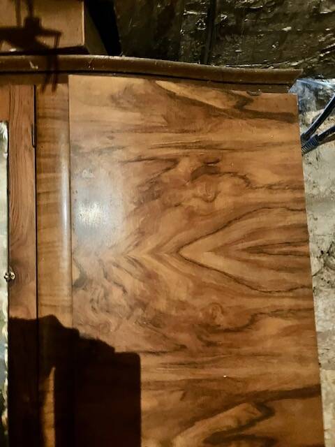 Old black marble chest of drawers