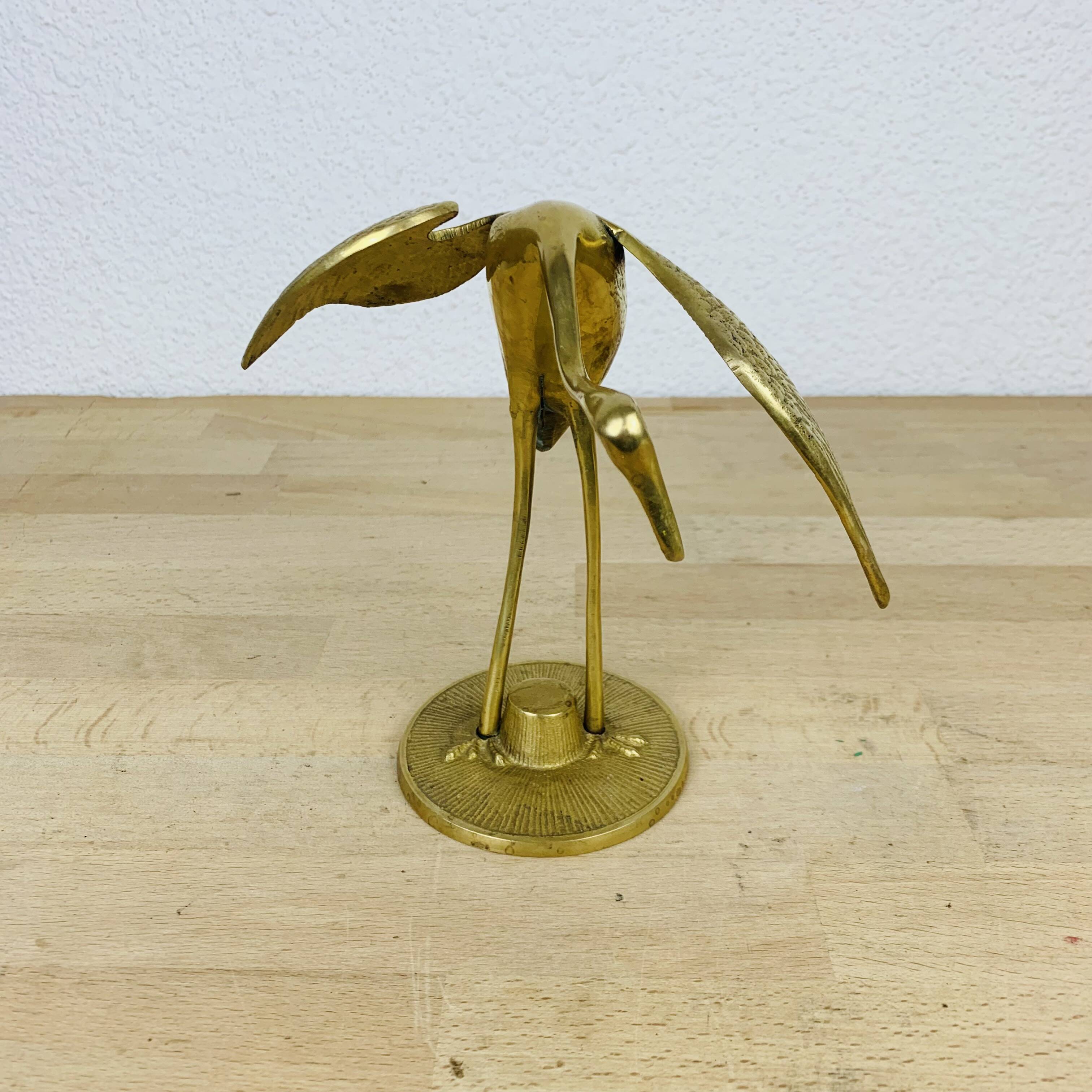 Vintage golden brass heron