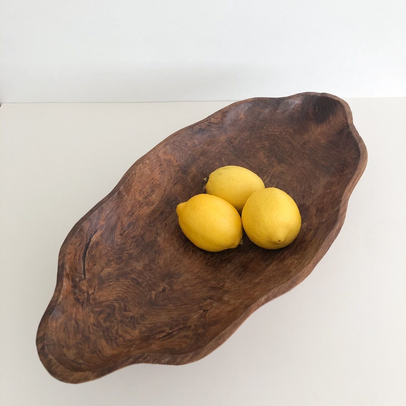Flat wooden bowl