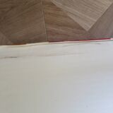 2 armchairs in woven rattan and wood, 1980s