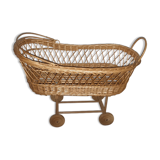 Vintage wicker cradle with wheels