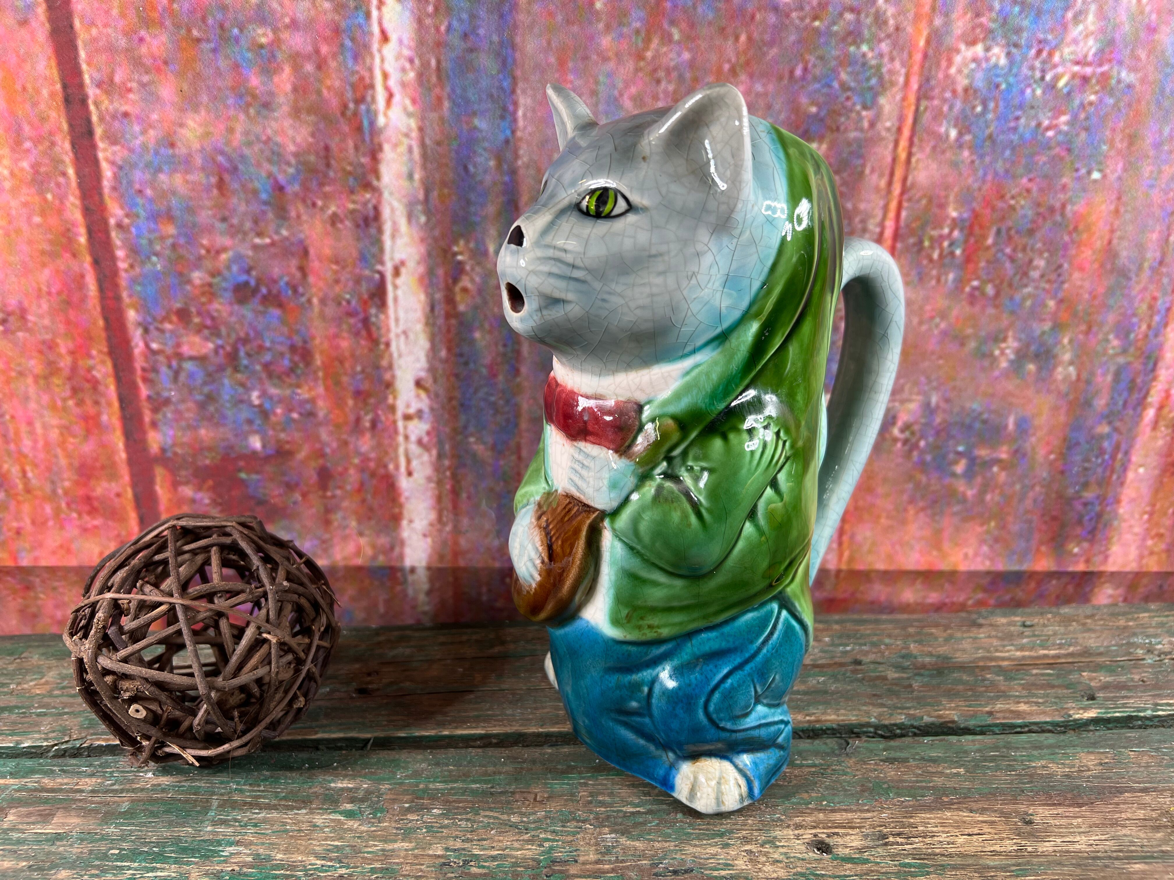 Pitcher slurry cat musician