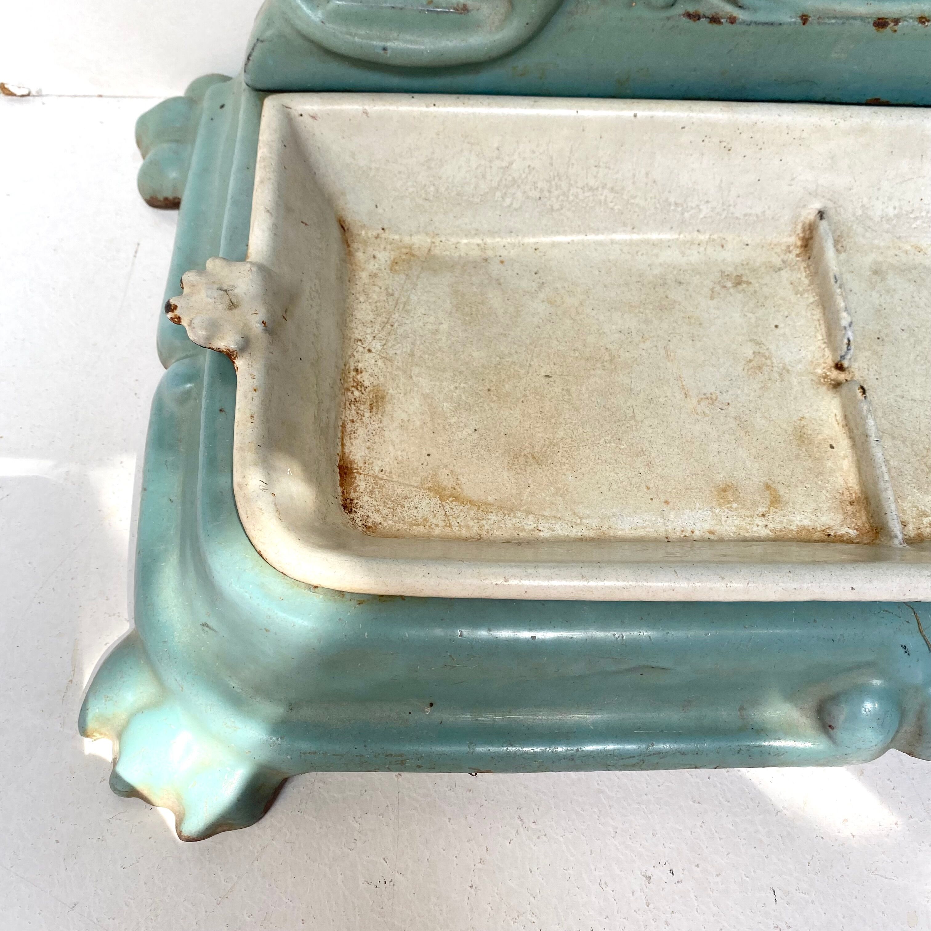 Enameled cast iron umbrella stand from the early 20th century