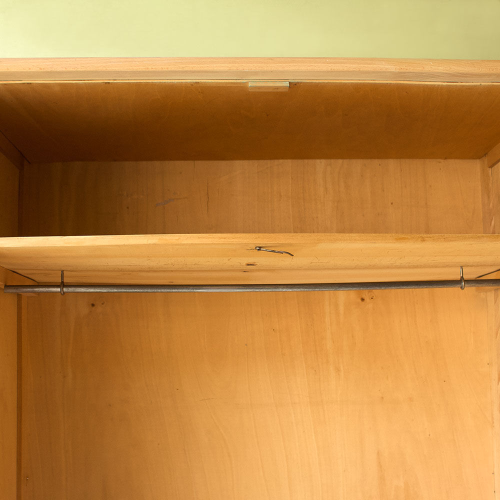 Wardrobe with compass feet