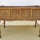 Veranda planter on vintage wicker legs