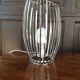 Cylinder design lamp with brushed metal blade