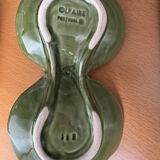 Salt and pepper shakers in the shape of a cabbage leaf.