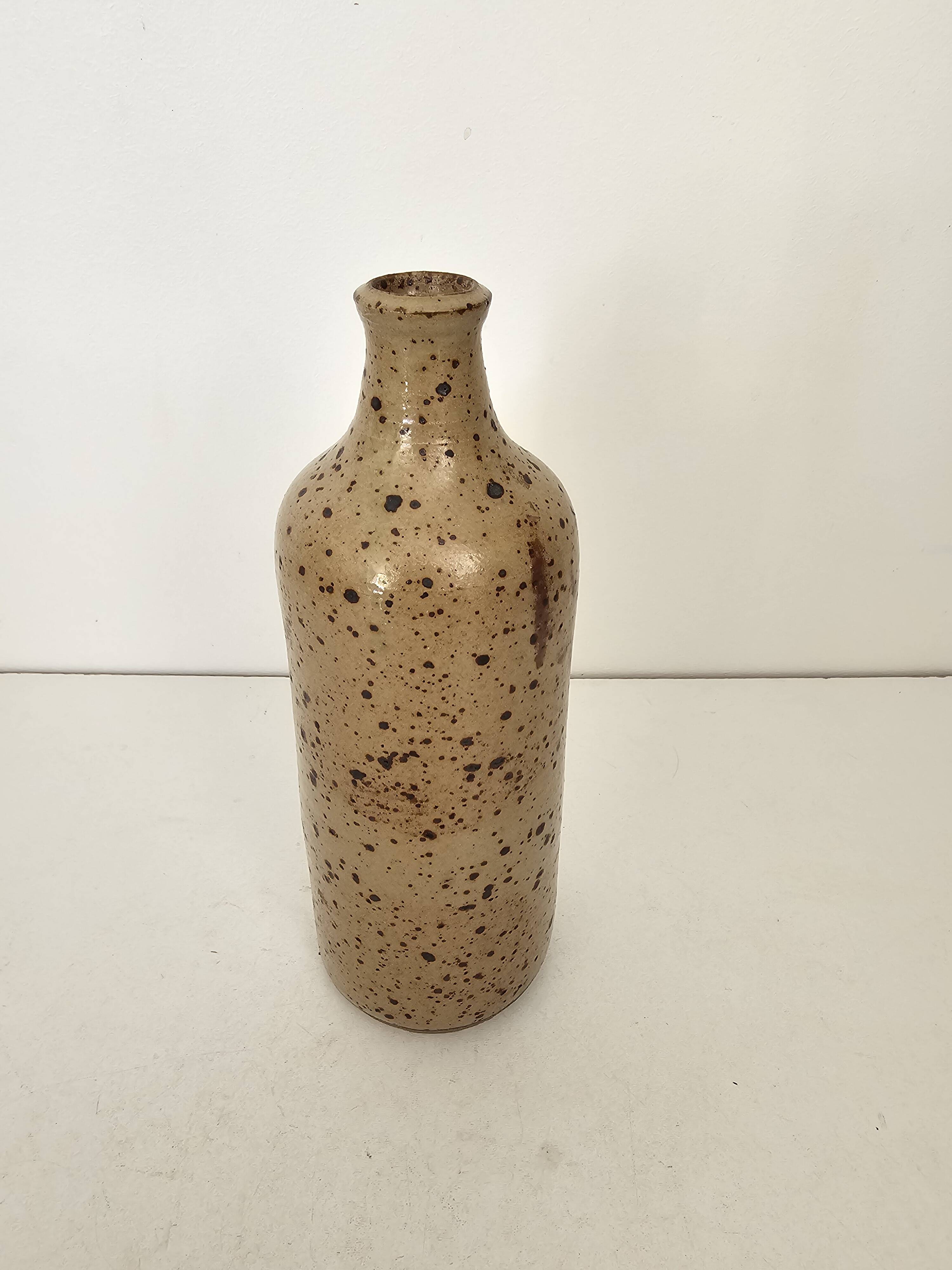 Pyrite stoneware single-flower vase in the shape of a bottle signed Aular?