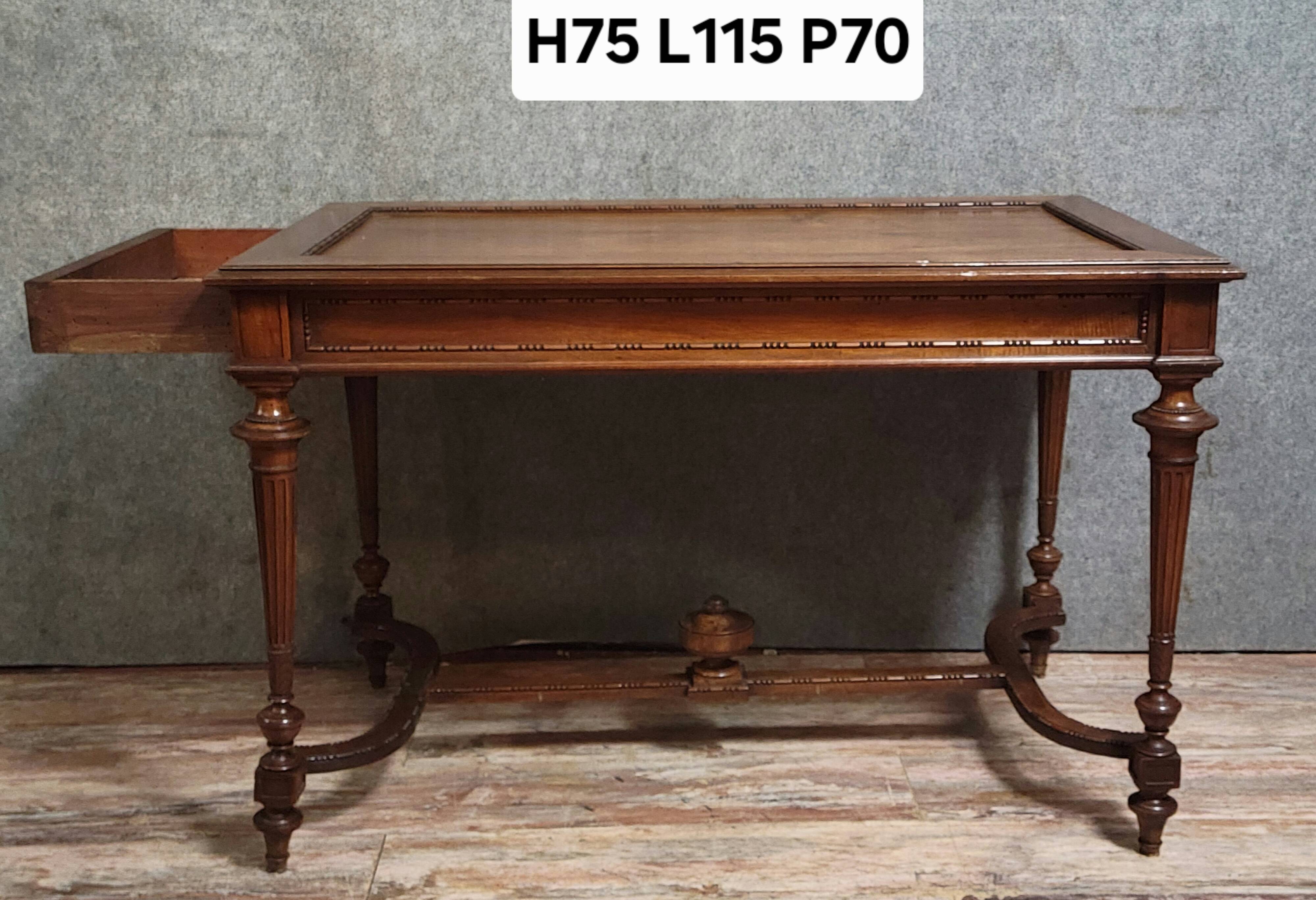 Louis XVI style desk with a curved top, in mahogany.