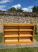 Low bookshelf in Art Deco style made of birch.