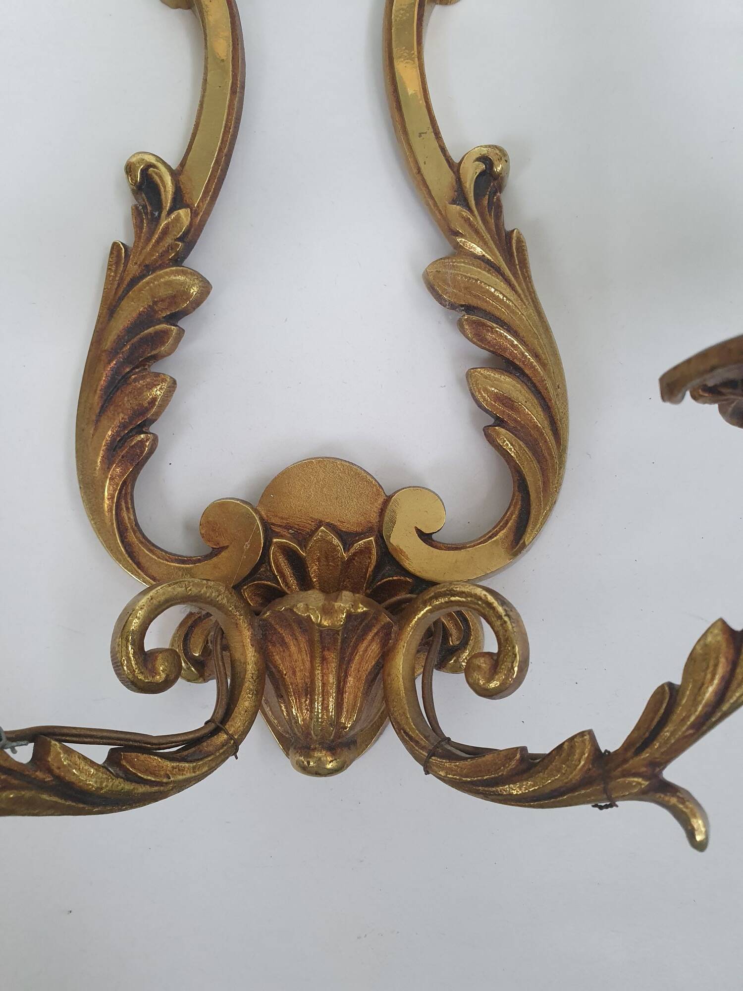 Pair of antique candlestick wall sconces