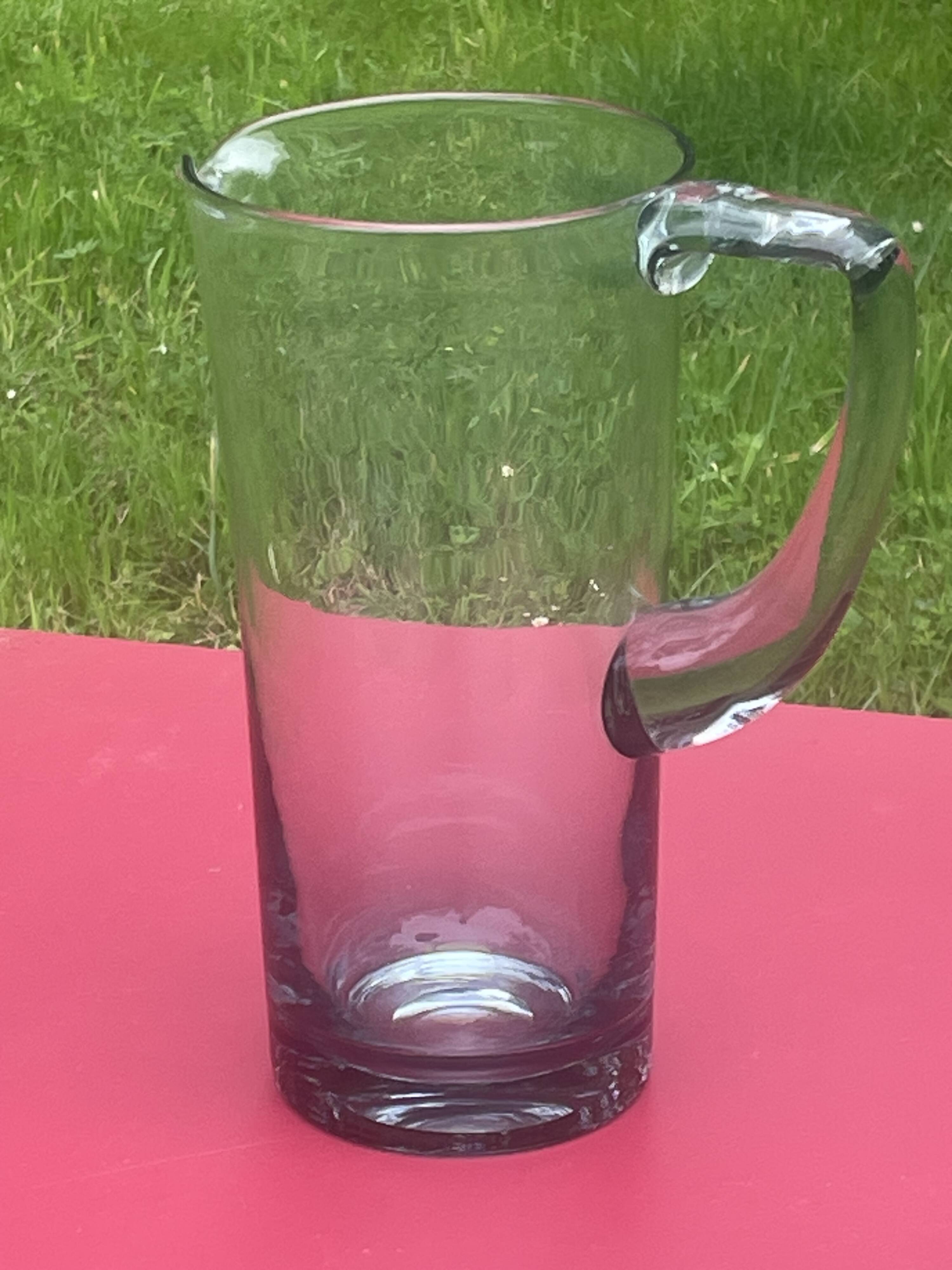 elegant water or orangeade pitcher in smoked glass from the 1970s - 25 cm