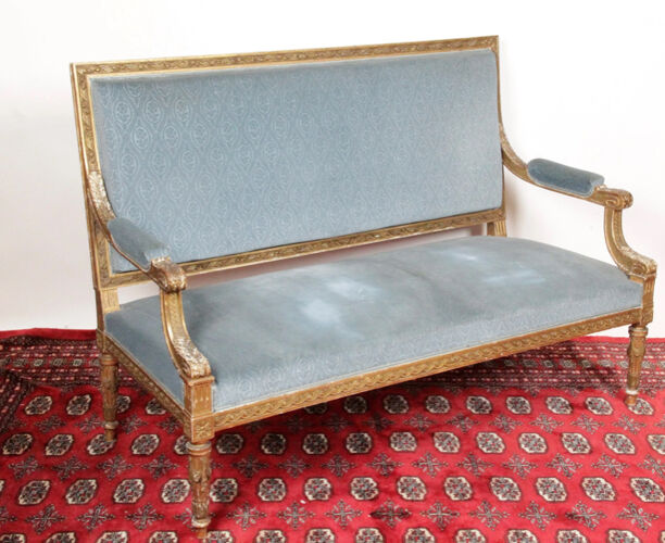 Canapé de style Louis XVI en bois doré