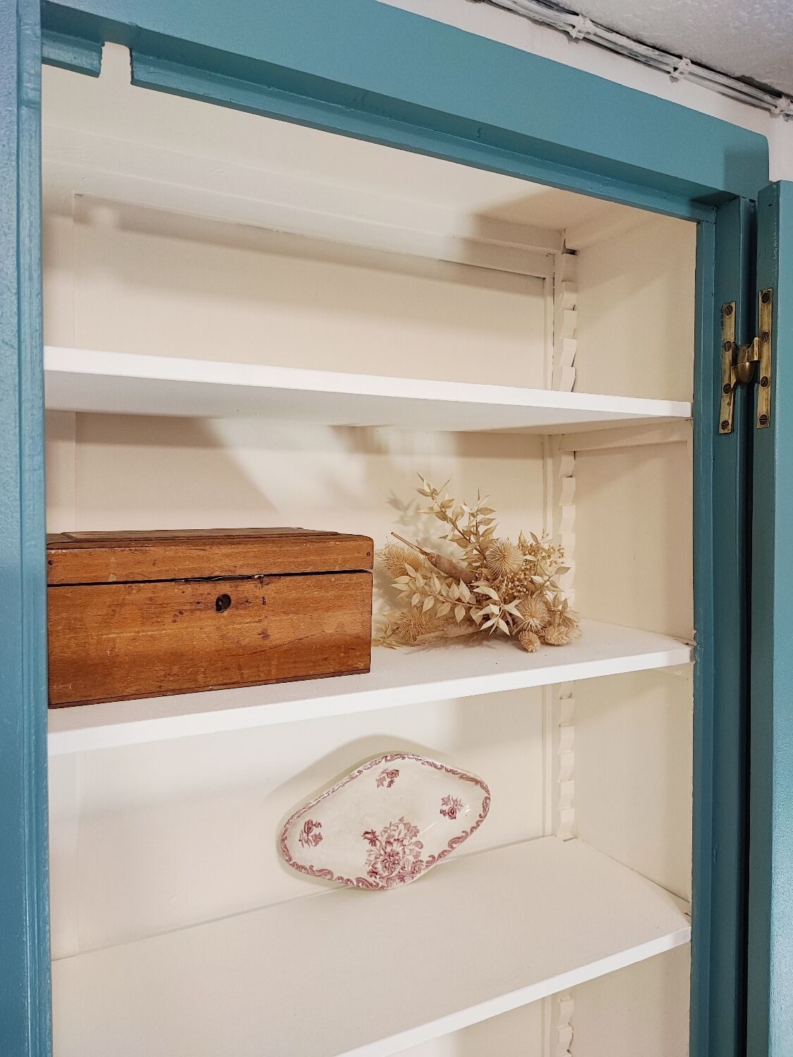 Blue vintage bookcase