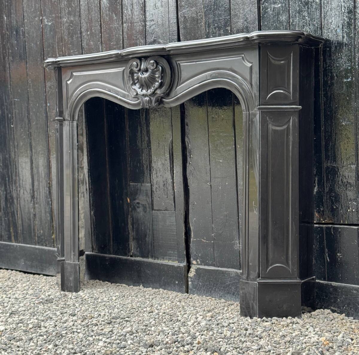 Louis XV style fireplace in black Belgian marble, circa 1880