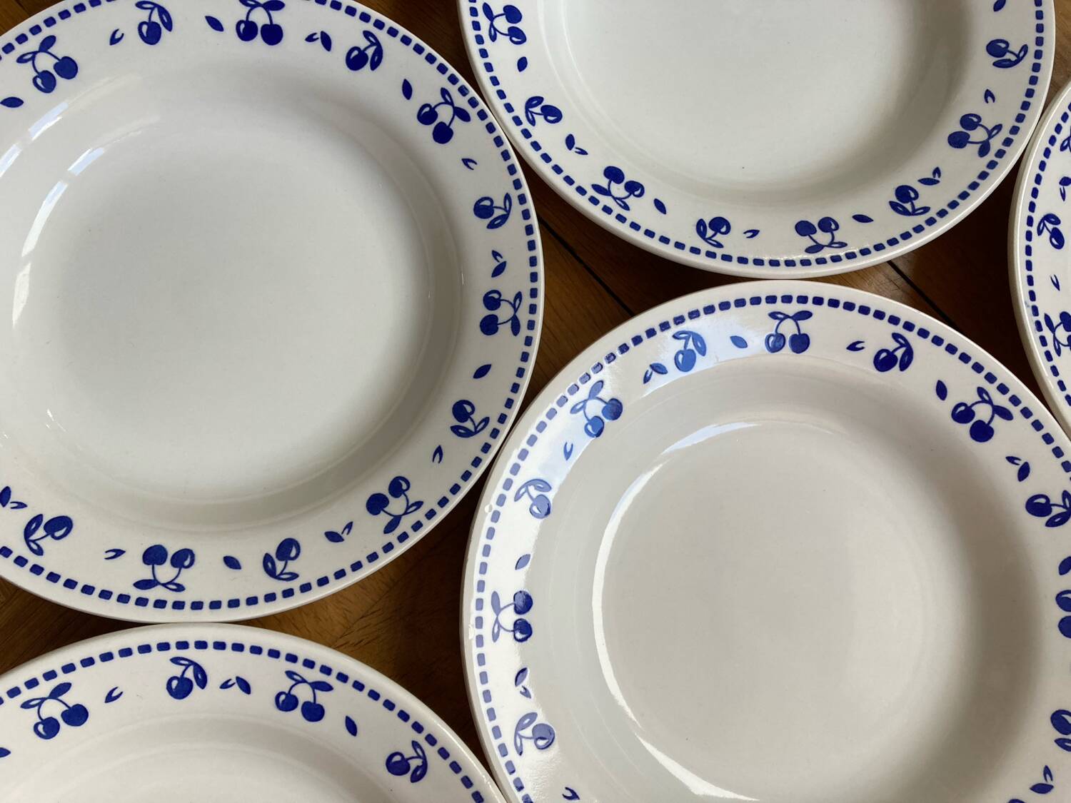 Vintage deep plates with blue cherry decor