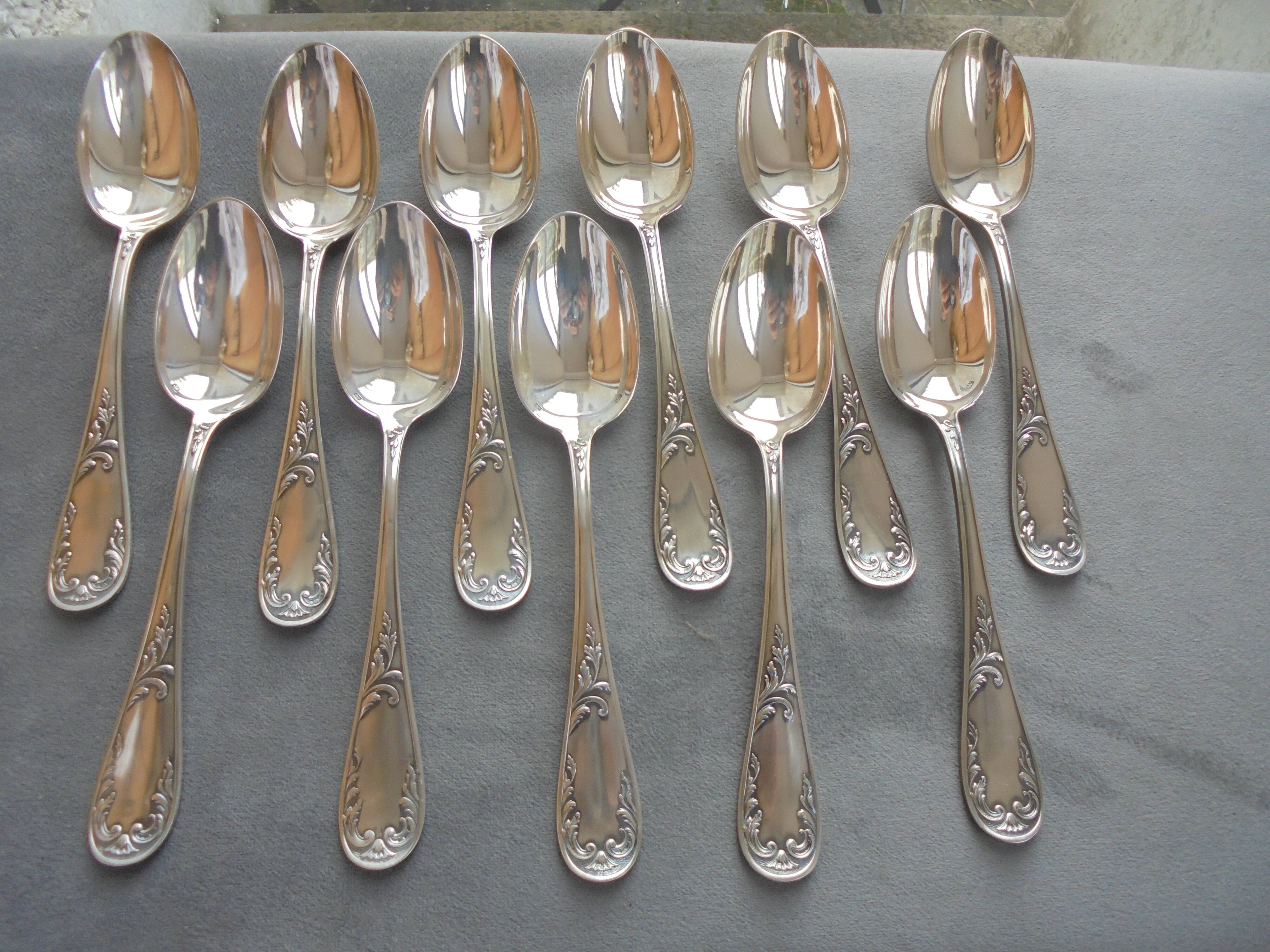 11 silver metal spoons