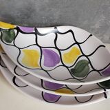 Three vintage free-form ceramic ravine dishes from the 1950s