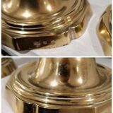 Pair of candle holders with punches