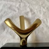 Vintage coat rack in lacquered metal with three golden aluminum hooks