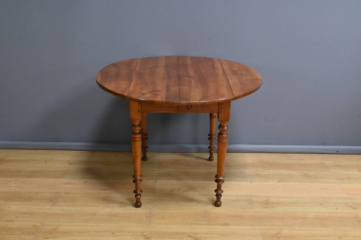 Table for 4 to 10 people with cherry wood extensions, Louis Philippe style – Late 11th century