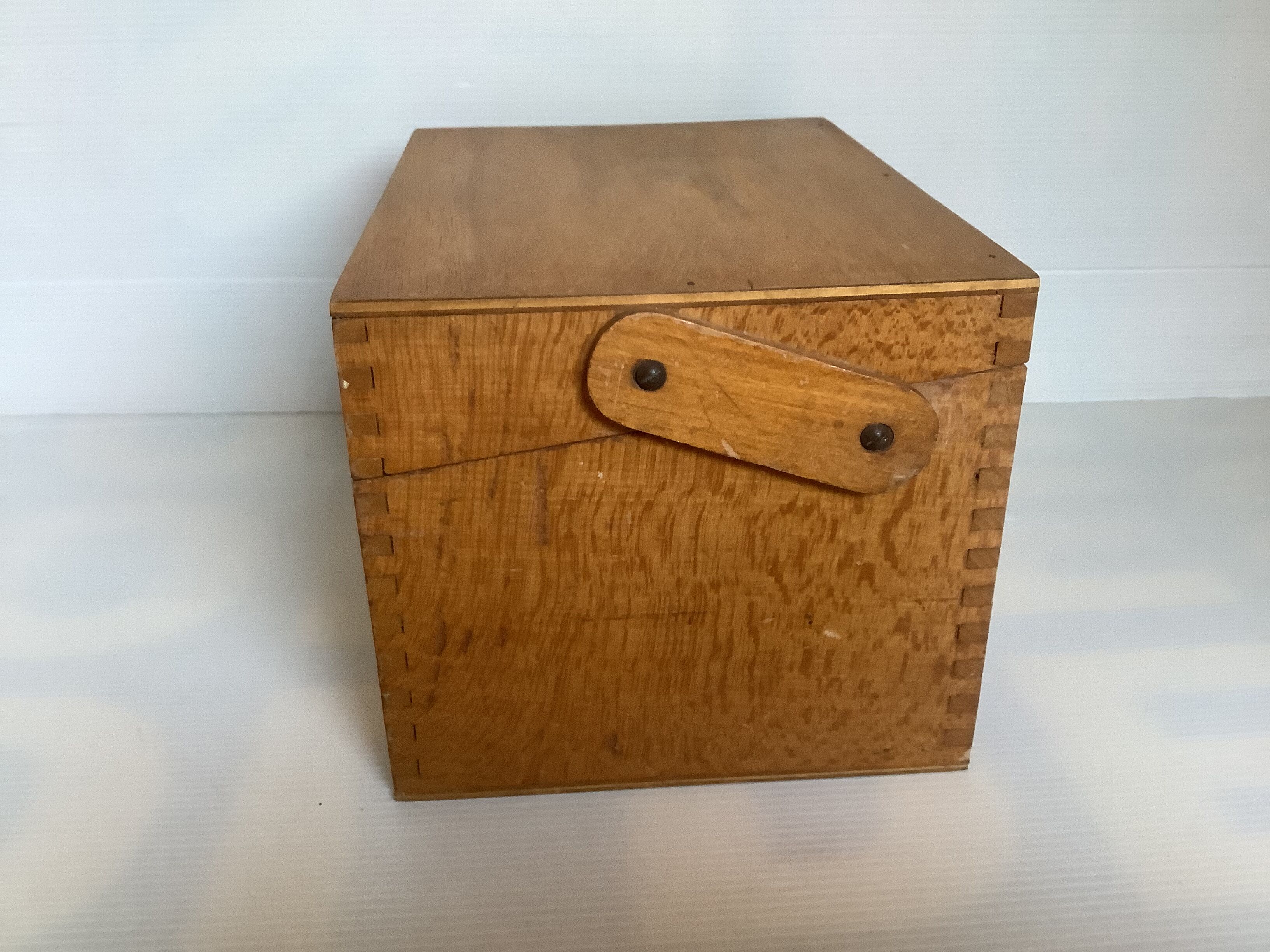 Wooden storage box dovetail mounting