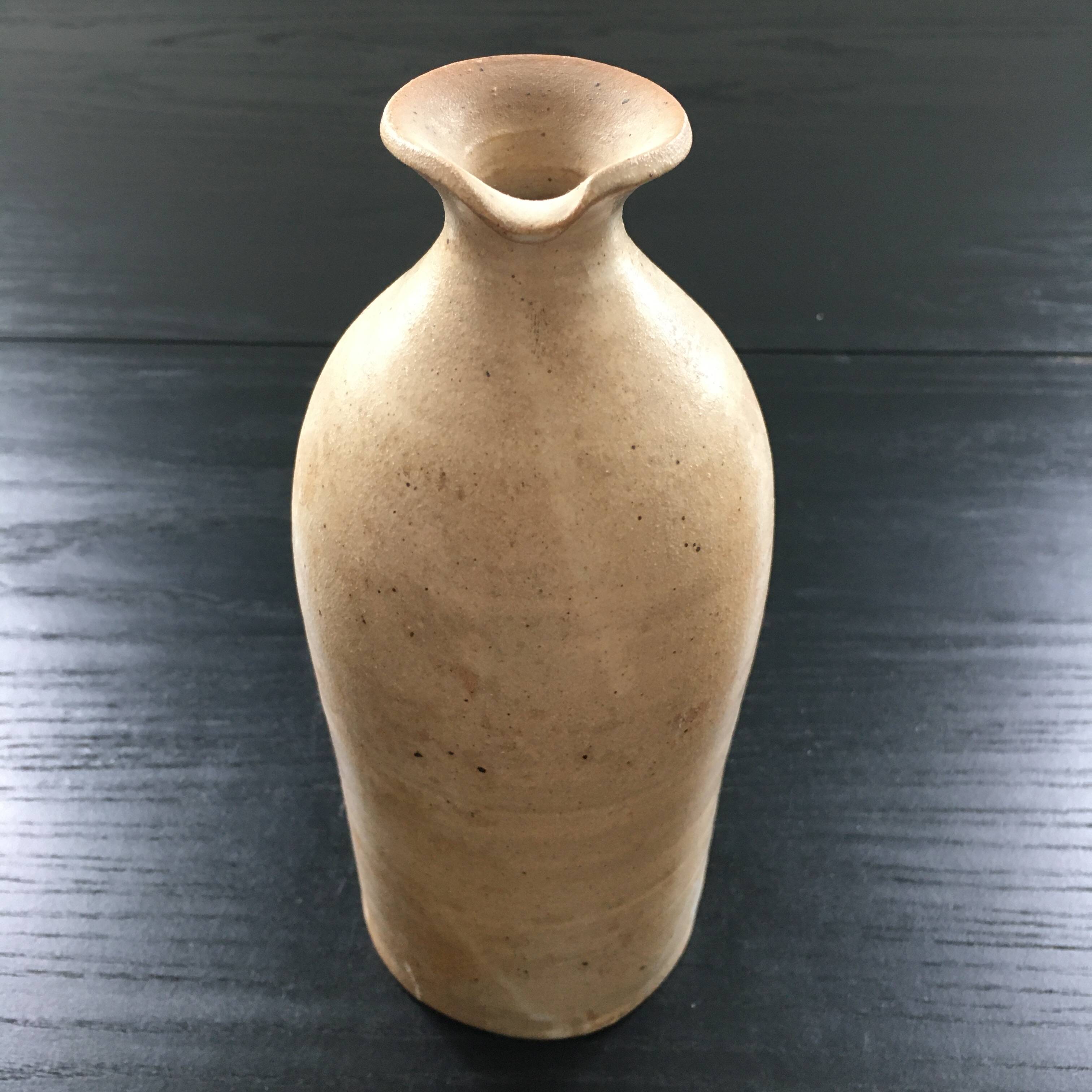 Beige stoneware bottle