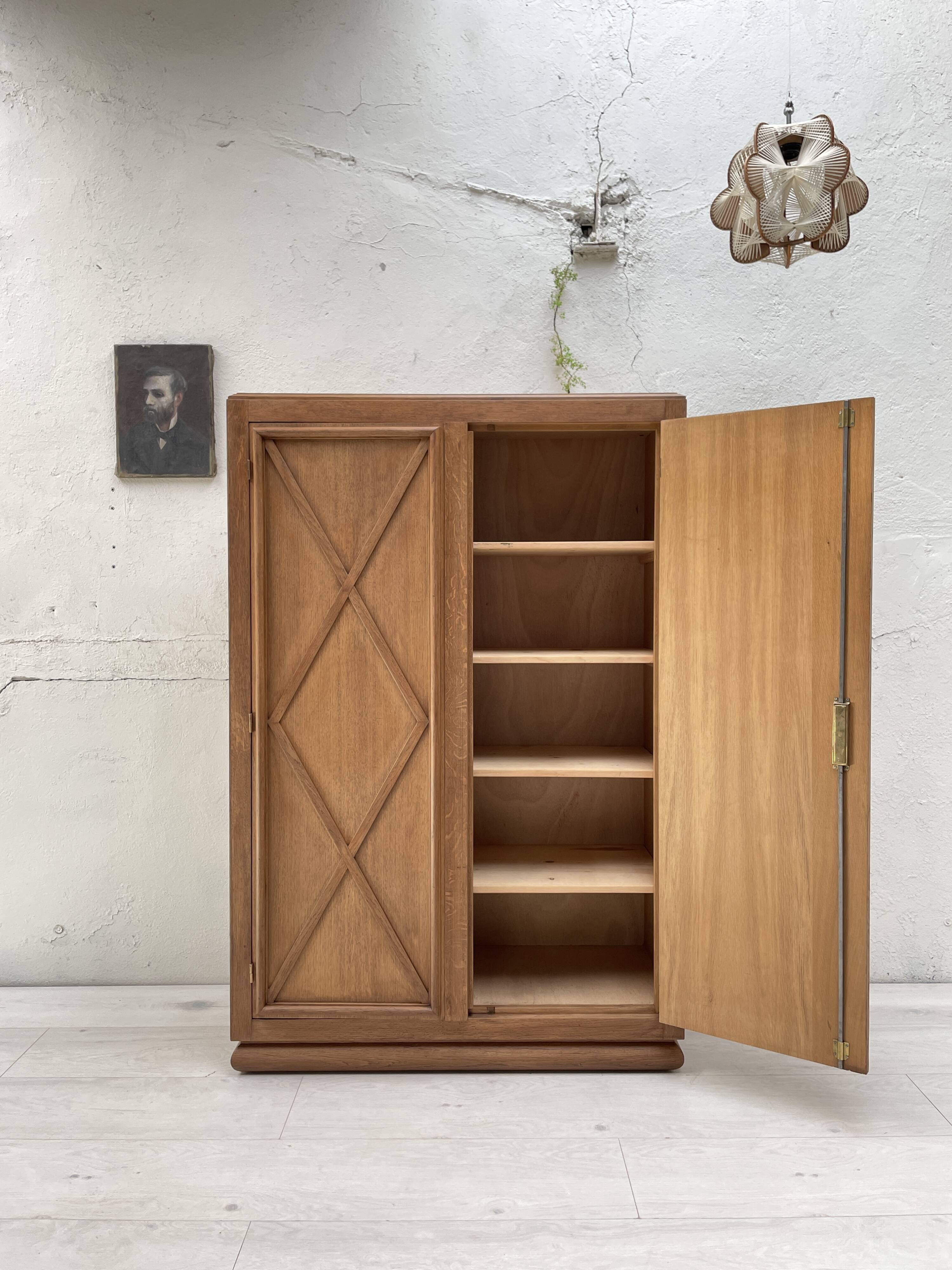 Storage unit in solid oak and veneer, circa 1960.