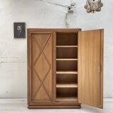 Storage unit in solid oak and veneer, circa 1960.