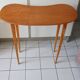 Scandinavian compass leg bean table