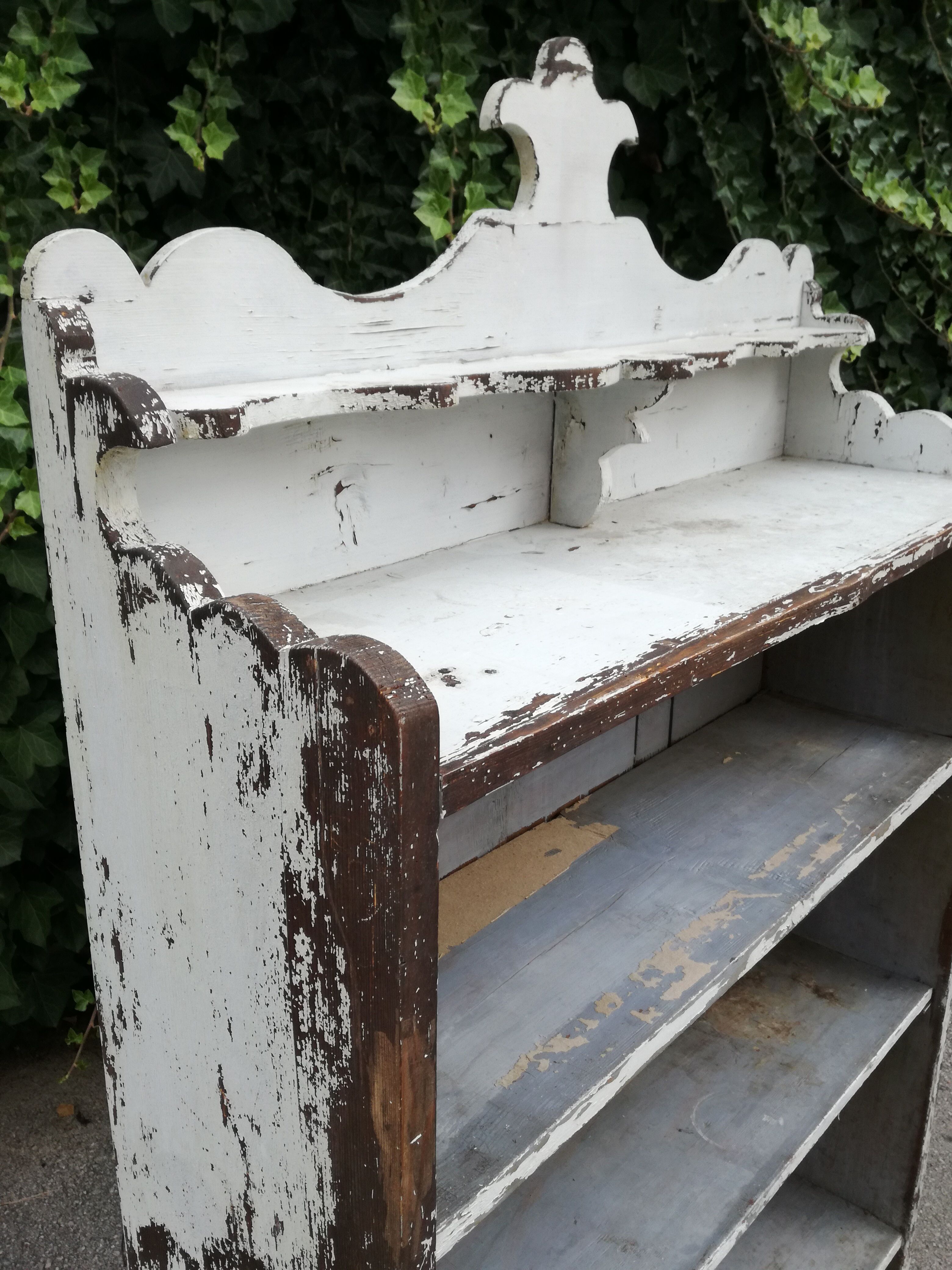 Old white shelf in weathered pine