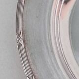 Three silver plated coasters