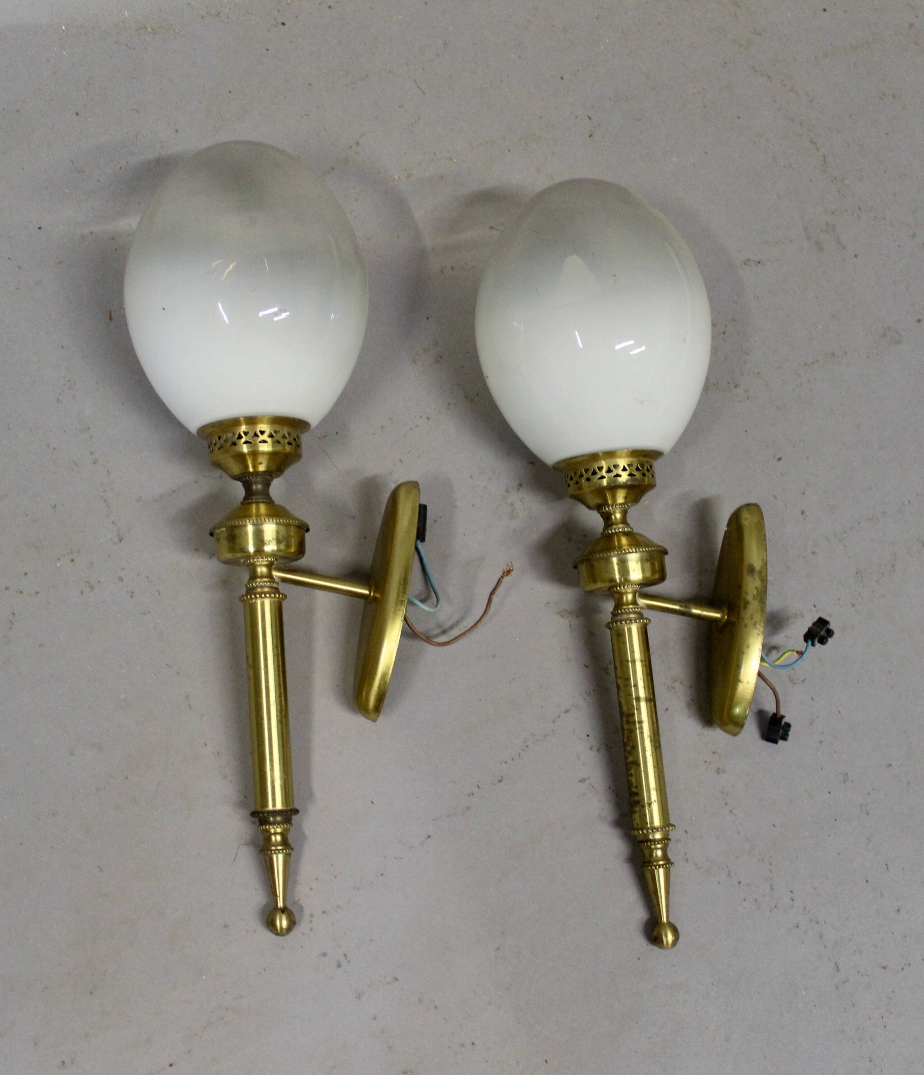 Pair of brass torchiere-style wall lights