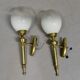 Pair of brass torchiere-style wall lights