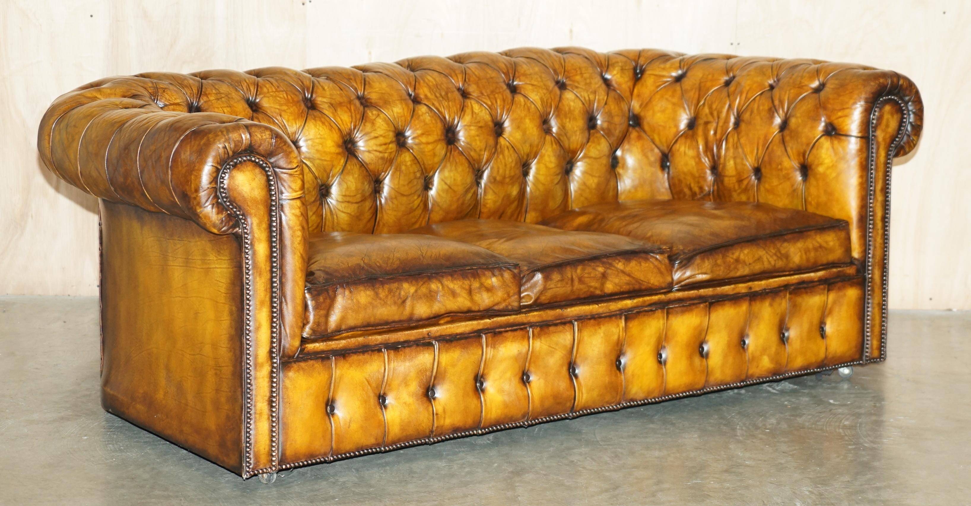 Vintage Chesterfield leather sofa bed, fully restored, circa 1940.