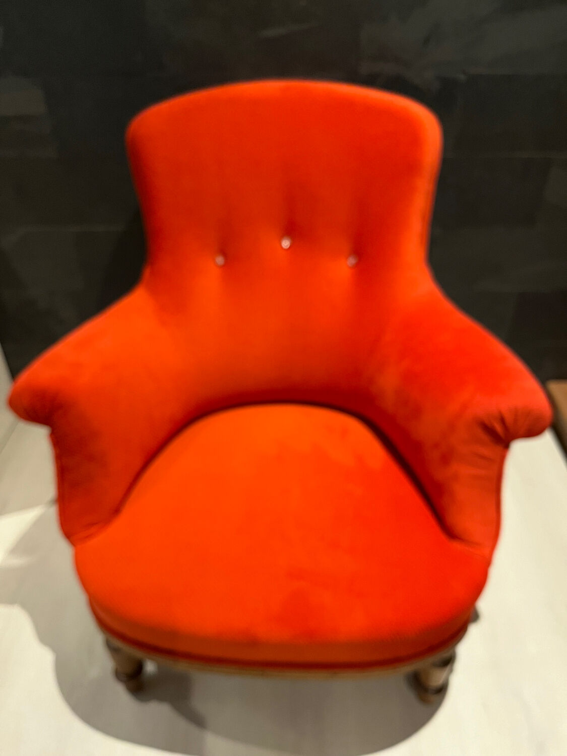 Antique reupholstered armchair