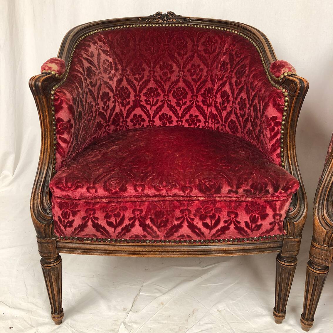 Pair of Transition period armchairs, trimmed with burgundy velvet