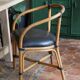 Lot de 4 fauteuils en rotin simili cuir