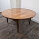 Round rosewood coffee table with adjustable height, Denmark, 1960.