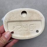 Wall-mounted earthenware soap holder