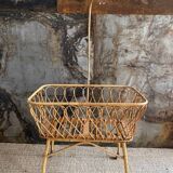 Rattan cradle with arrow