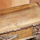 Antique fireplace from around 1880 in solid hand-carved elm with openwork columns.