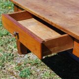 Rustic old wooden coffee table with crossbar and drawer