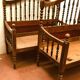 Two benches has folder and open armrest 20th century