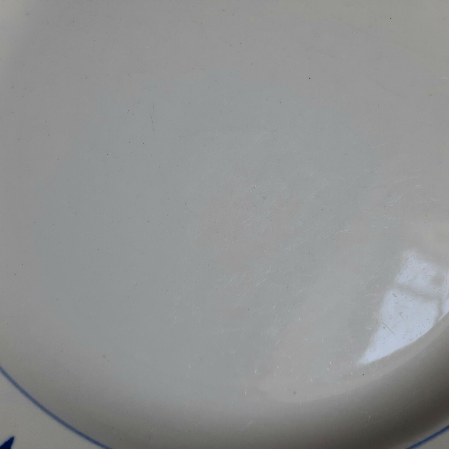 Mismatched old dessert plates accompanied by a dish