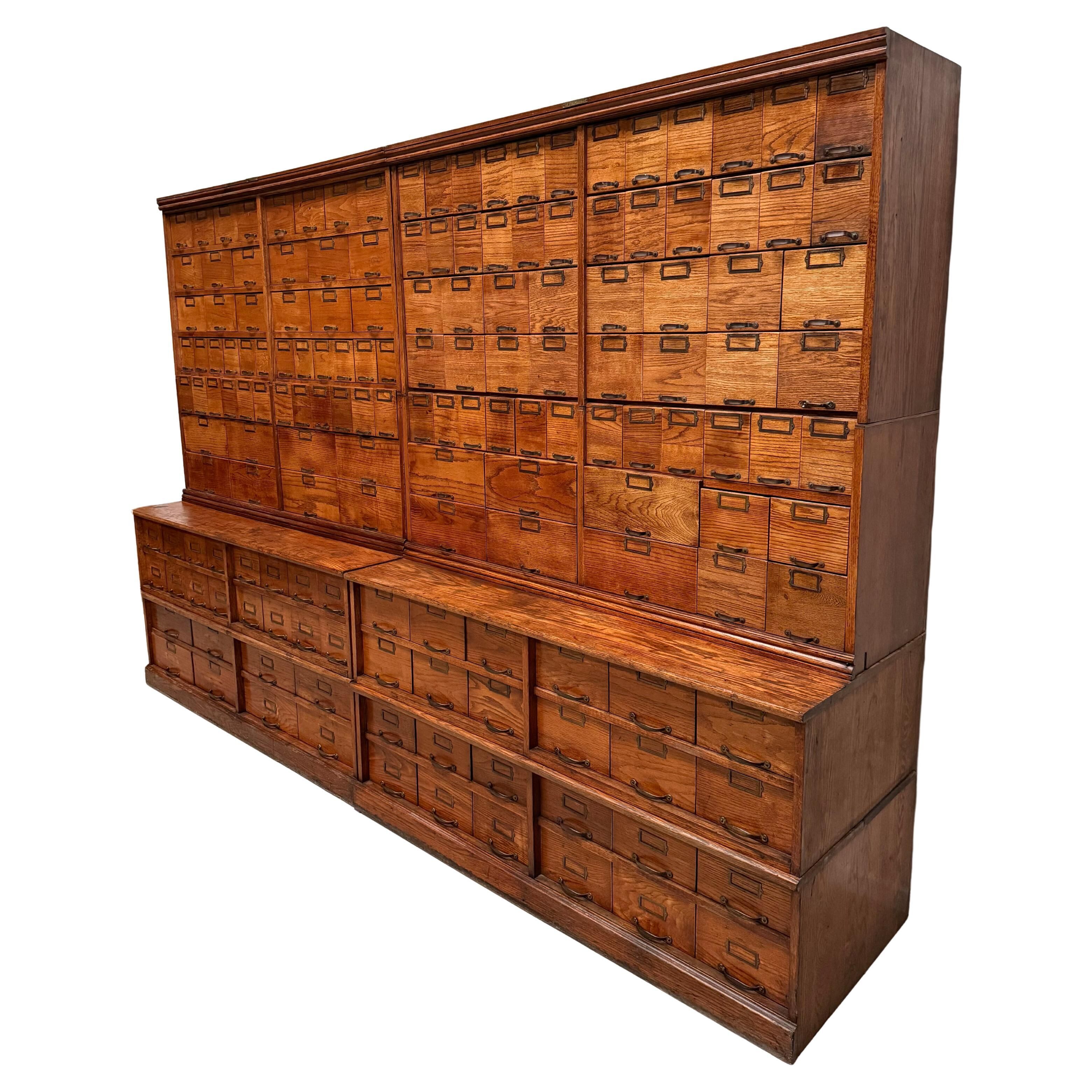 Antique very large American oak grain / apothecary cabinet, ca 1900