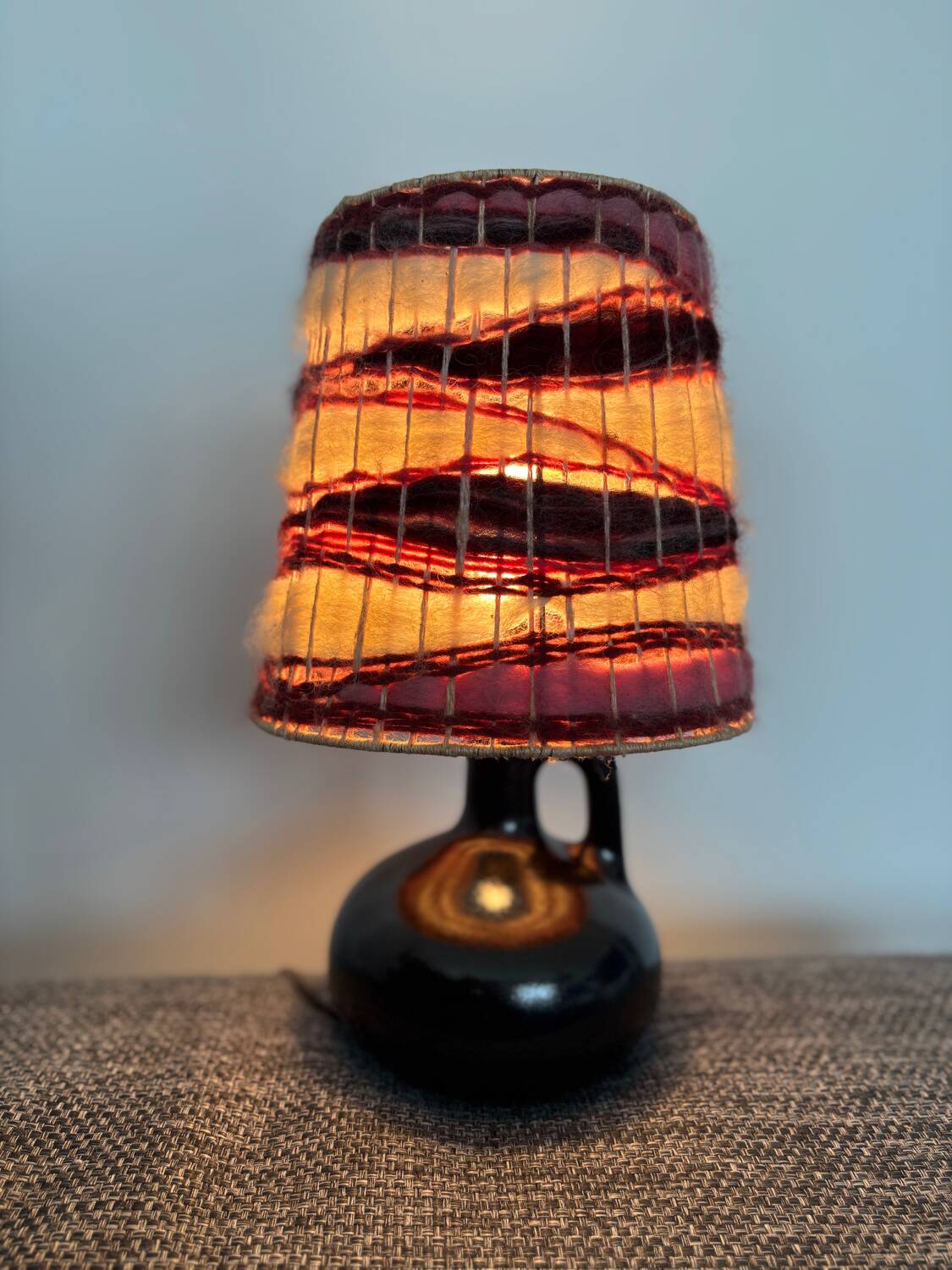 Vintage black ceramic lamp with hand-woven wool shade