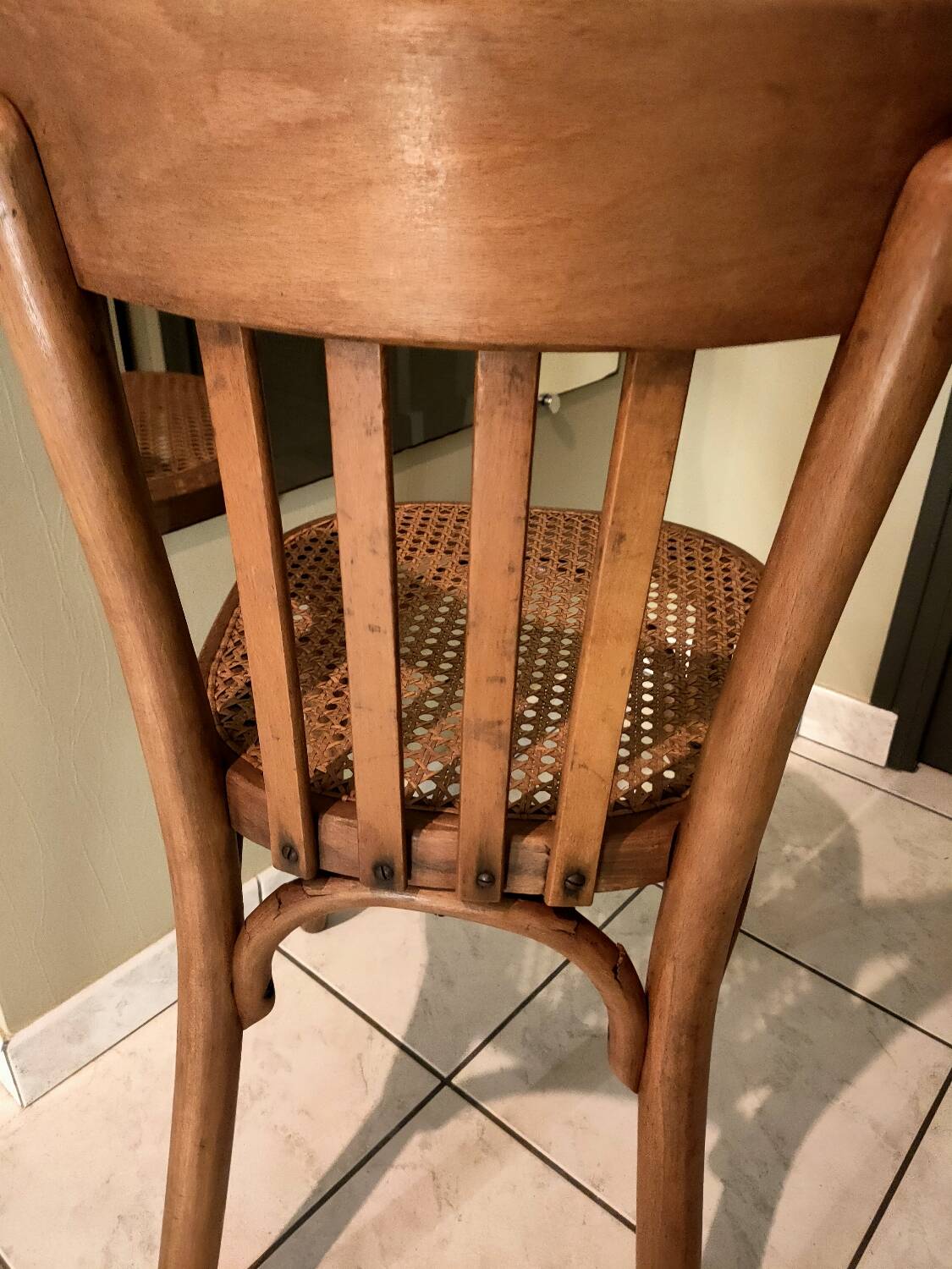 Old bistro chair with caned seat