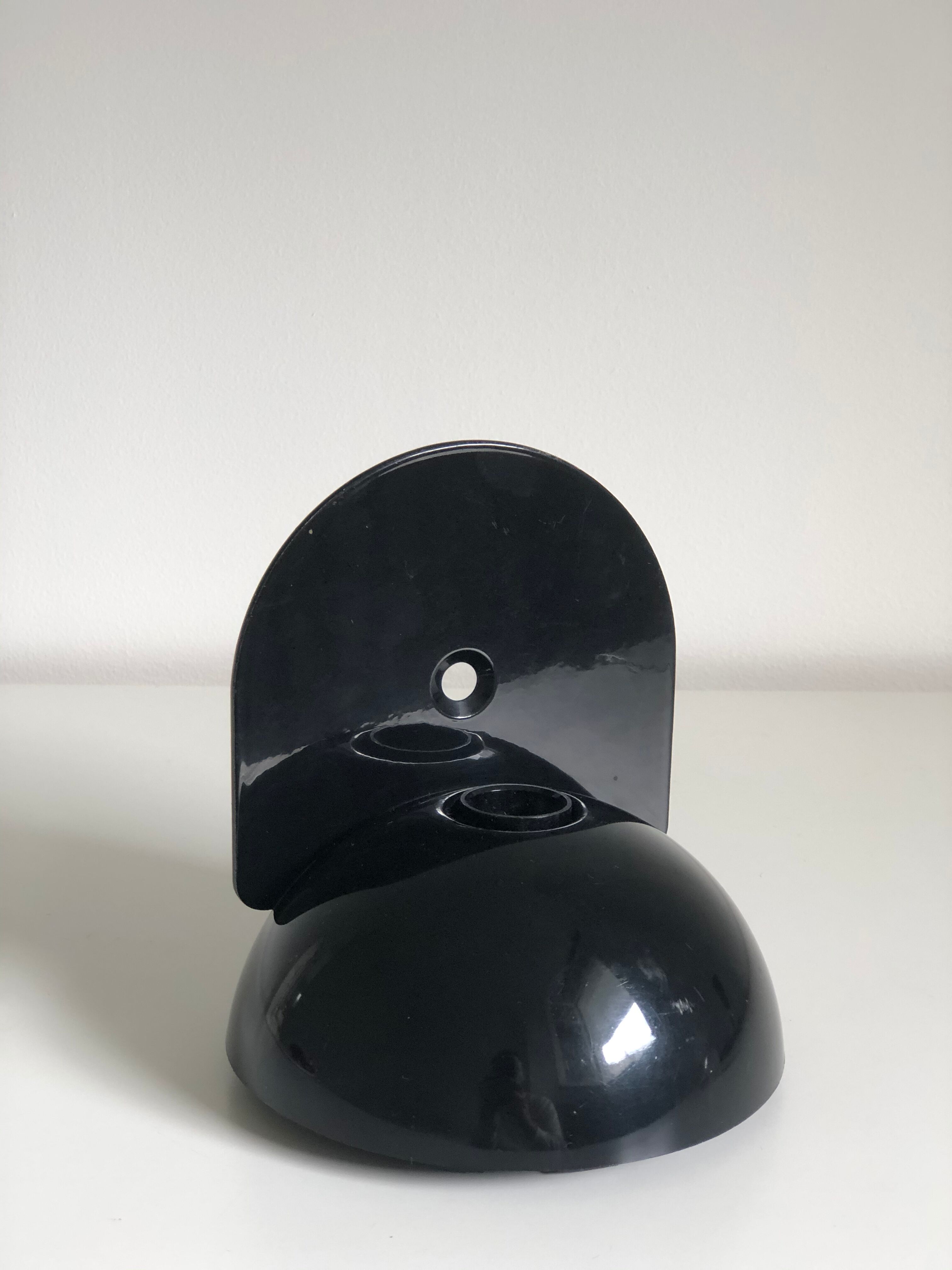 Claudio Dini's black Buco applicator edited by Artemide, 1974
