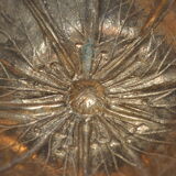 Empty-pocket flower in solid brass